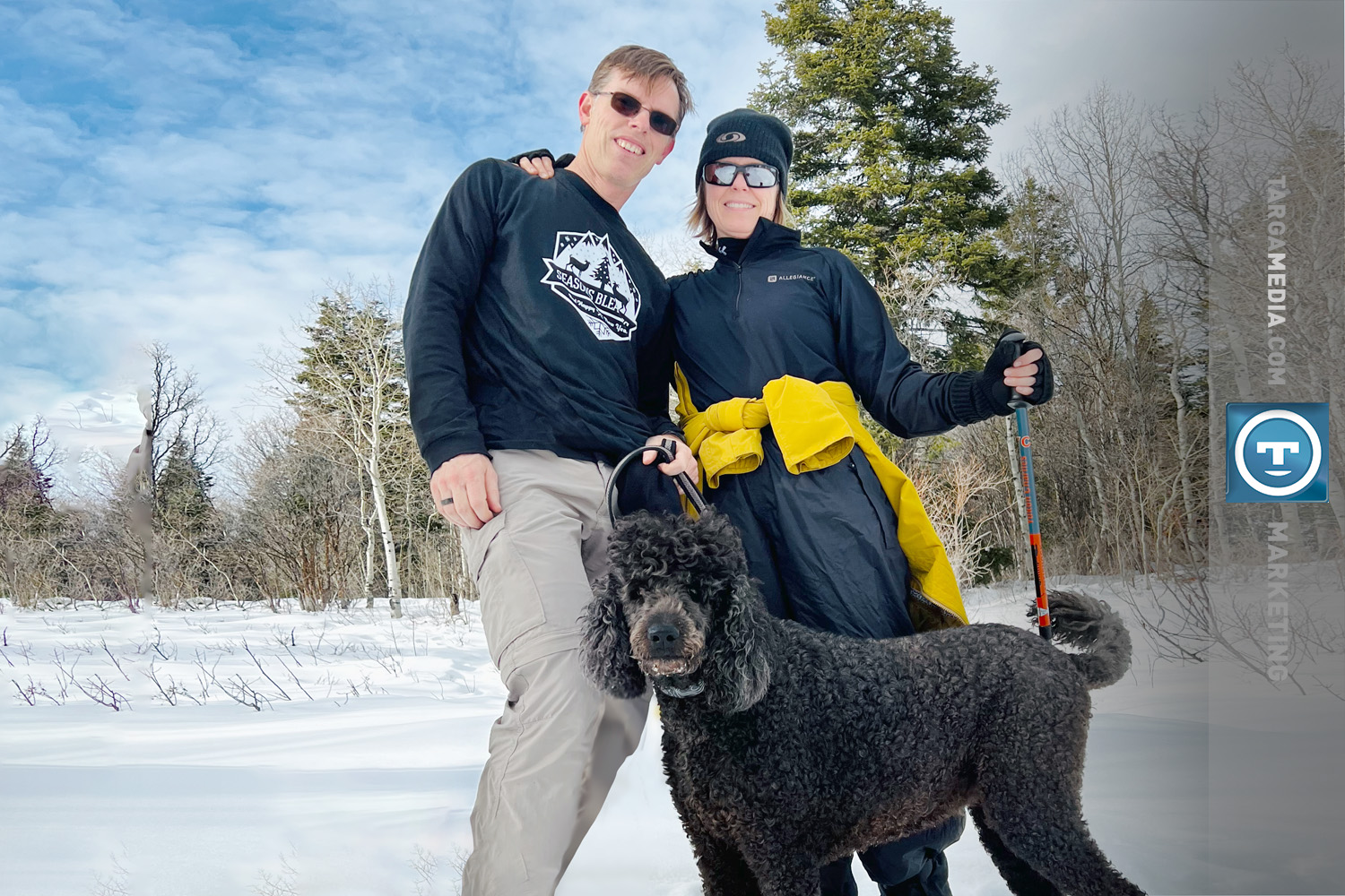 Jason and Heather Steed Showshoeing with Labradoodle Targa Media Utah mountains