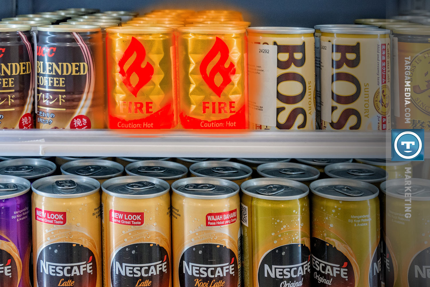 Shelf of canned goods, center can is decorated with flames and labeled "fire"